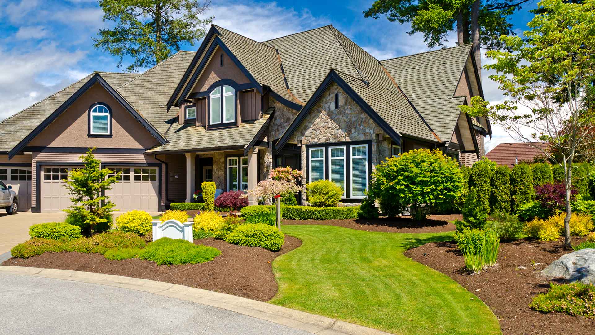 Stone house landscaped yard